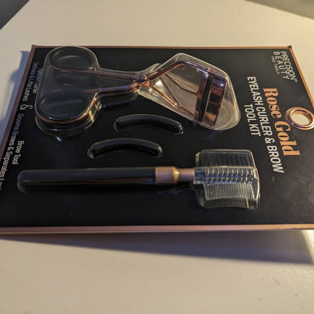 Brand new eyelash curler with eyebrows tool